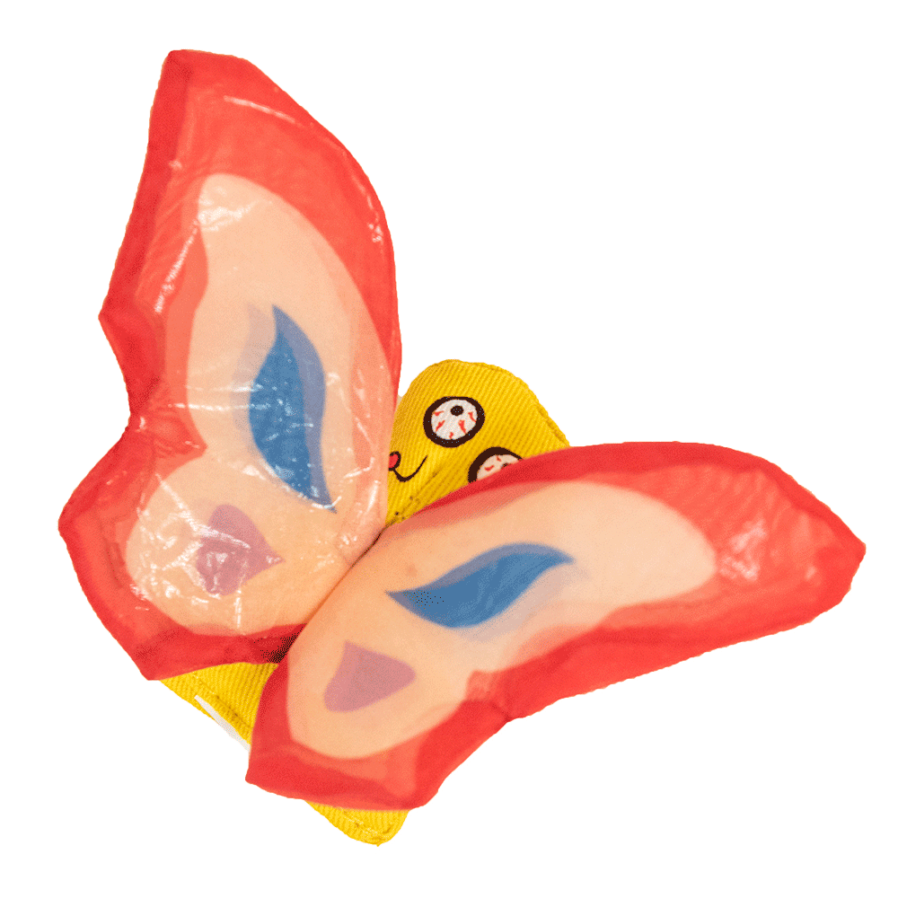 Toy lips with red lips and yellow face on a white background
