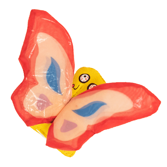 Toy lips with red lips and yellow face on a white background